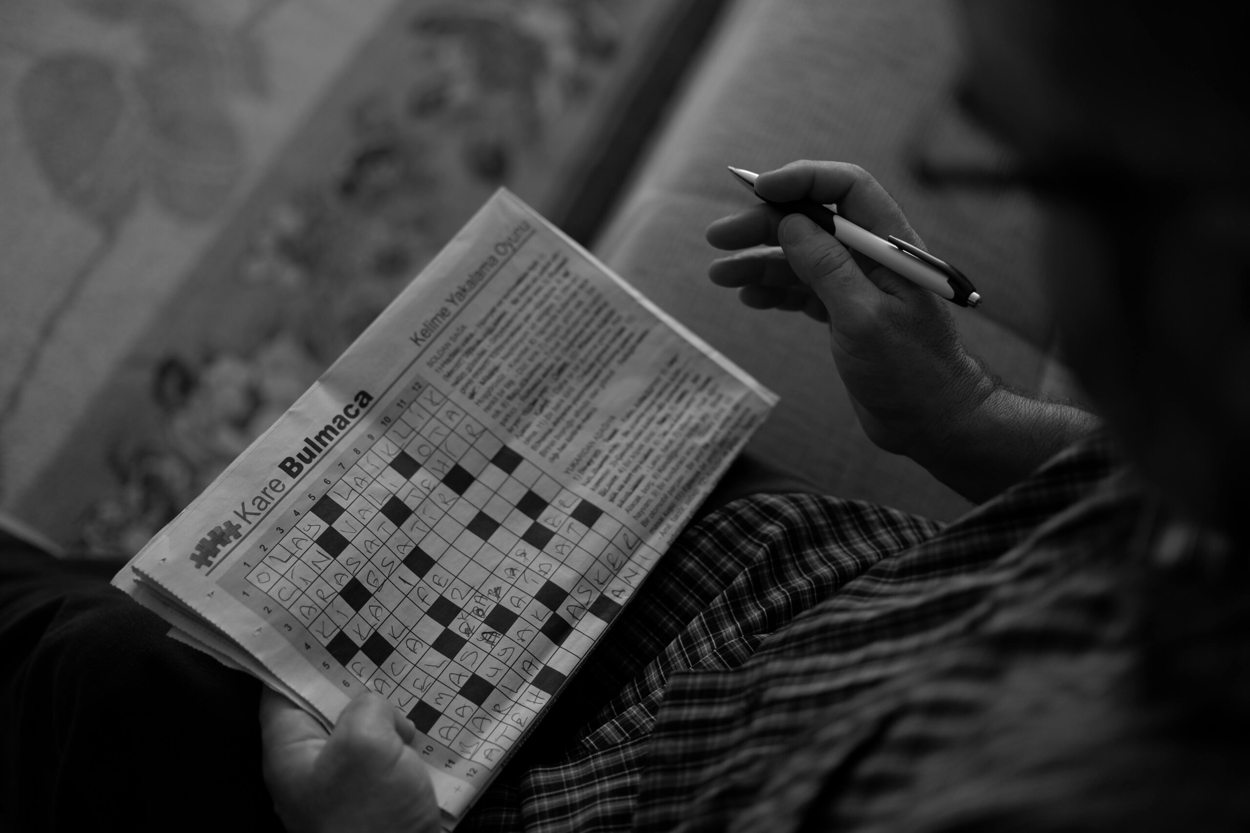 person playing crossword