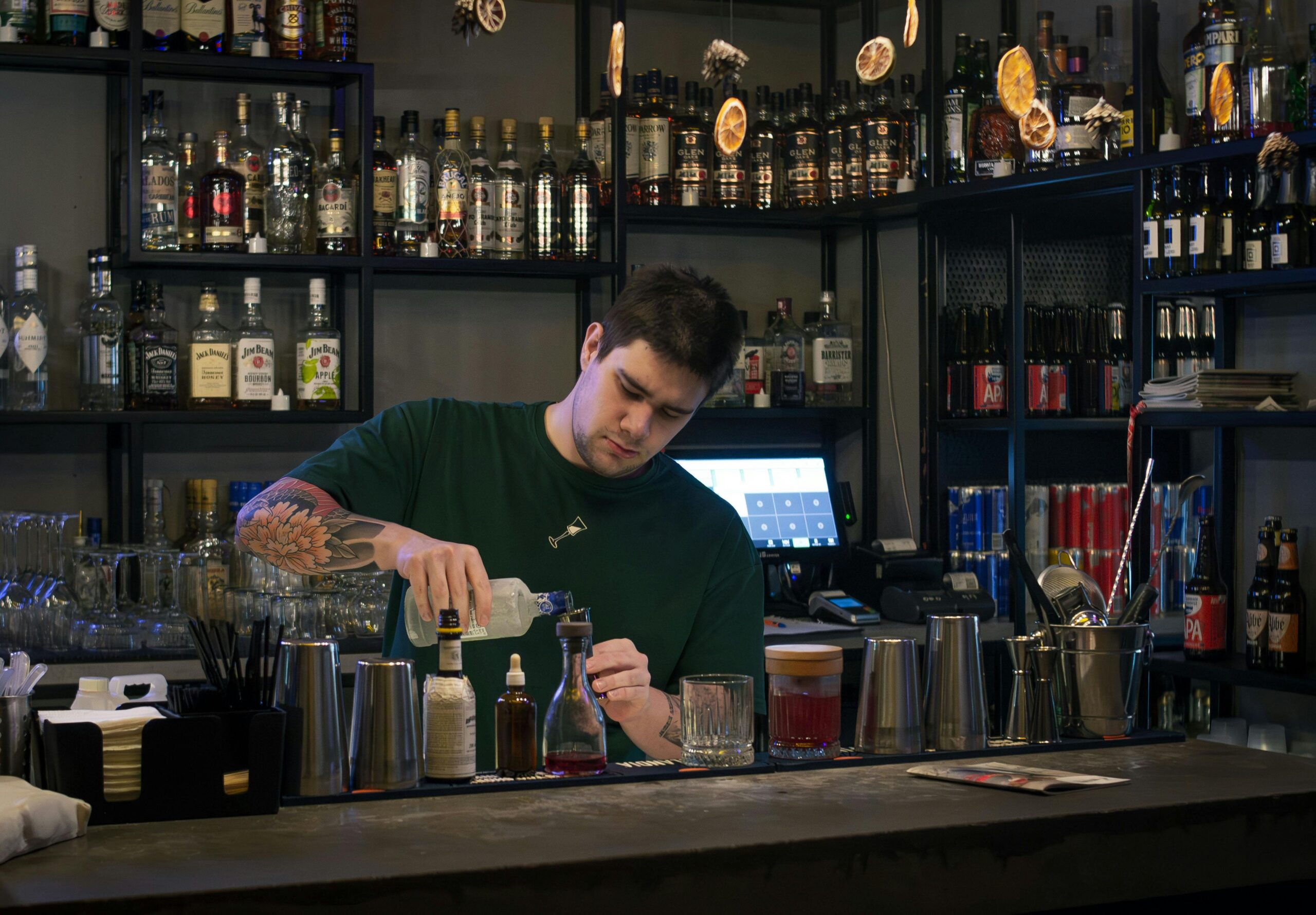 person making some drinks for people