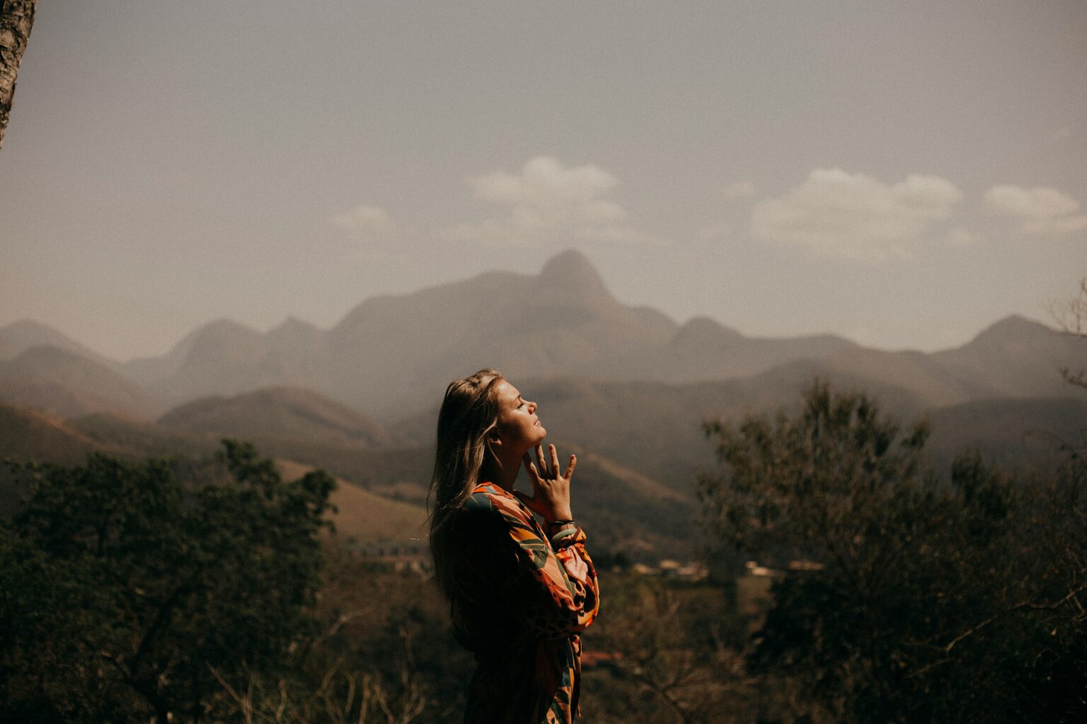 woman breathing in the mountain