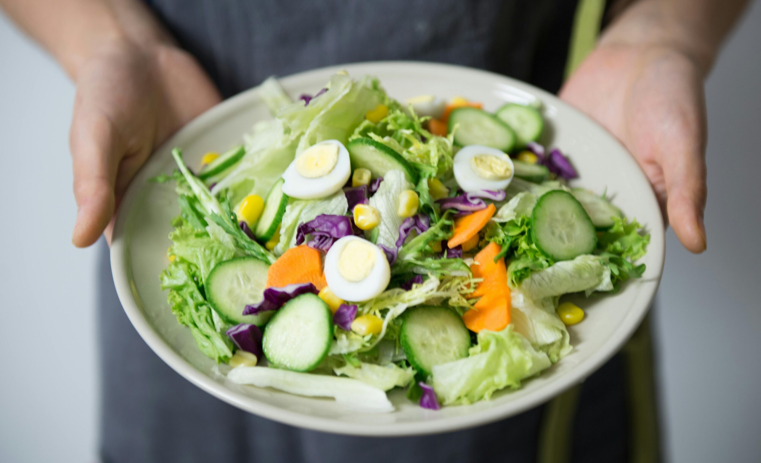 person eating healthy salad