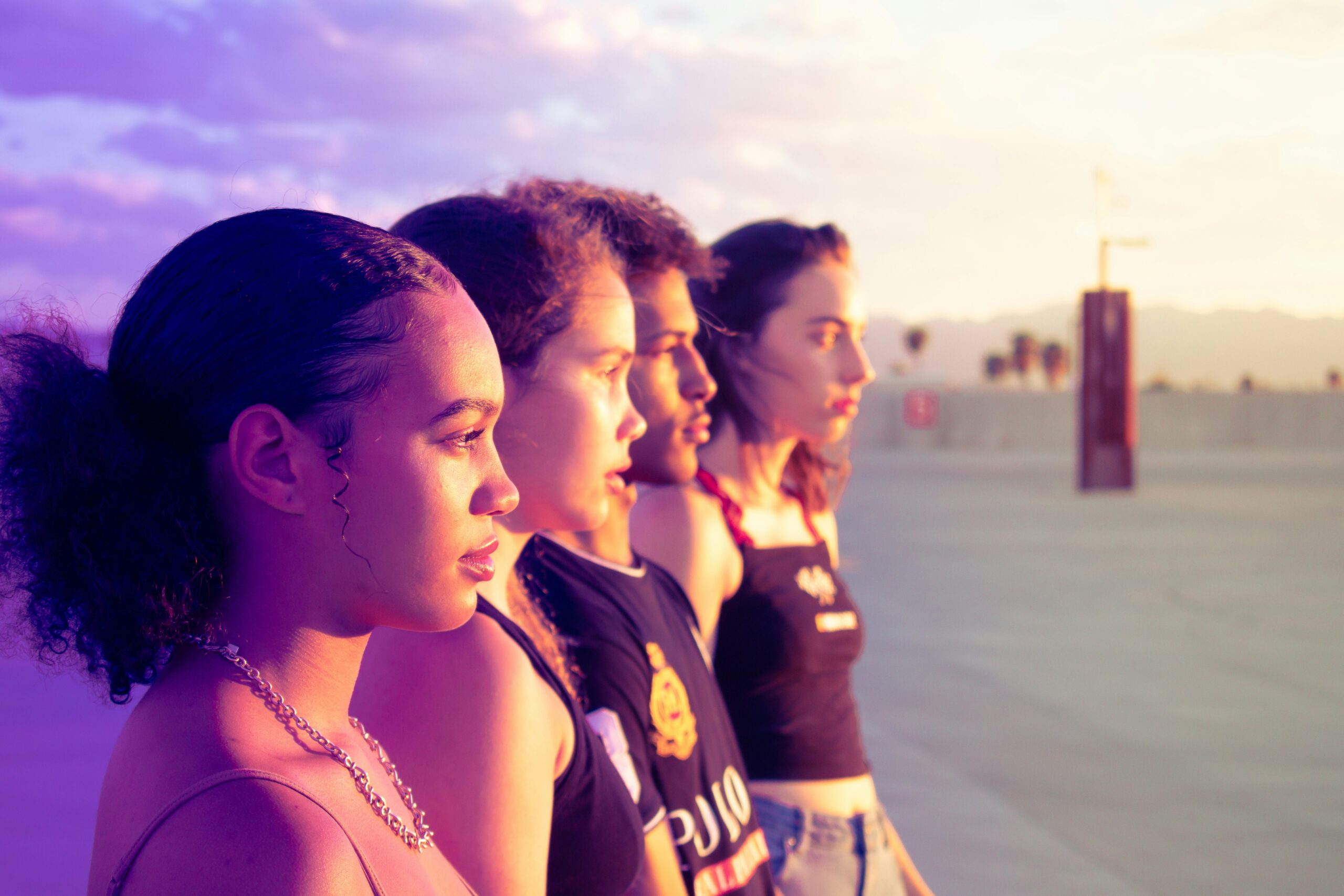 teenagers looking out at the ocean