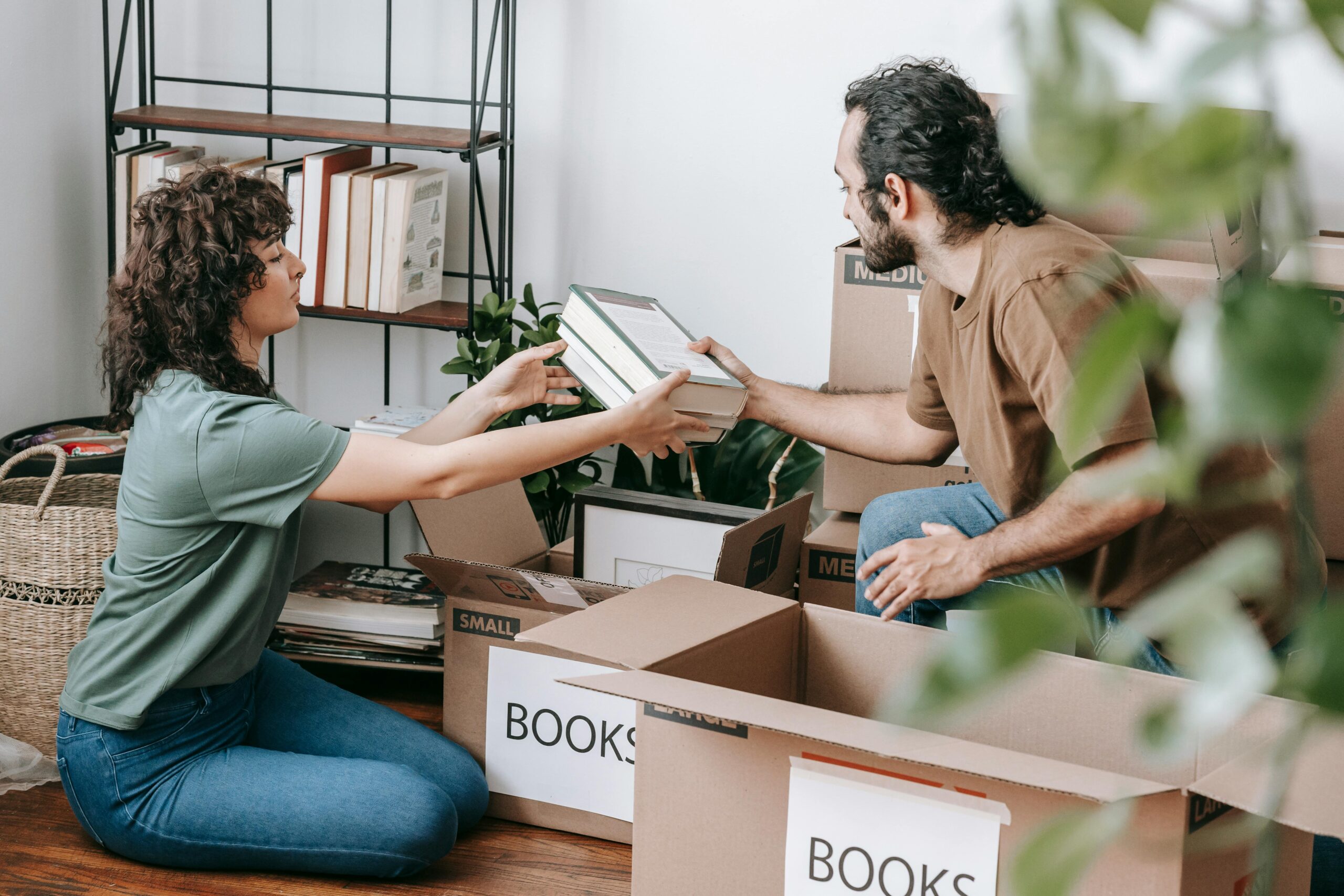 couple helping each other in house