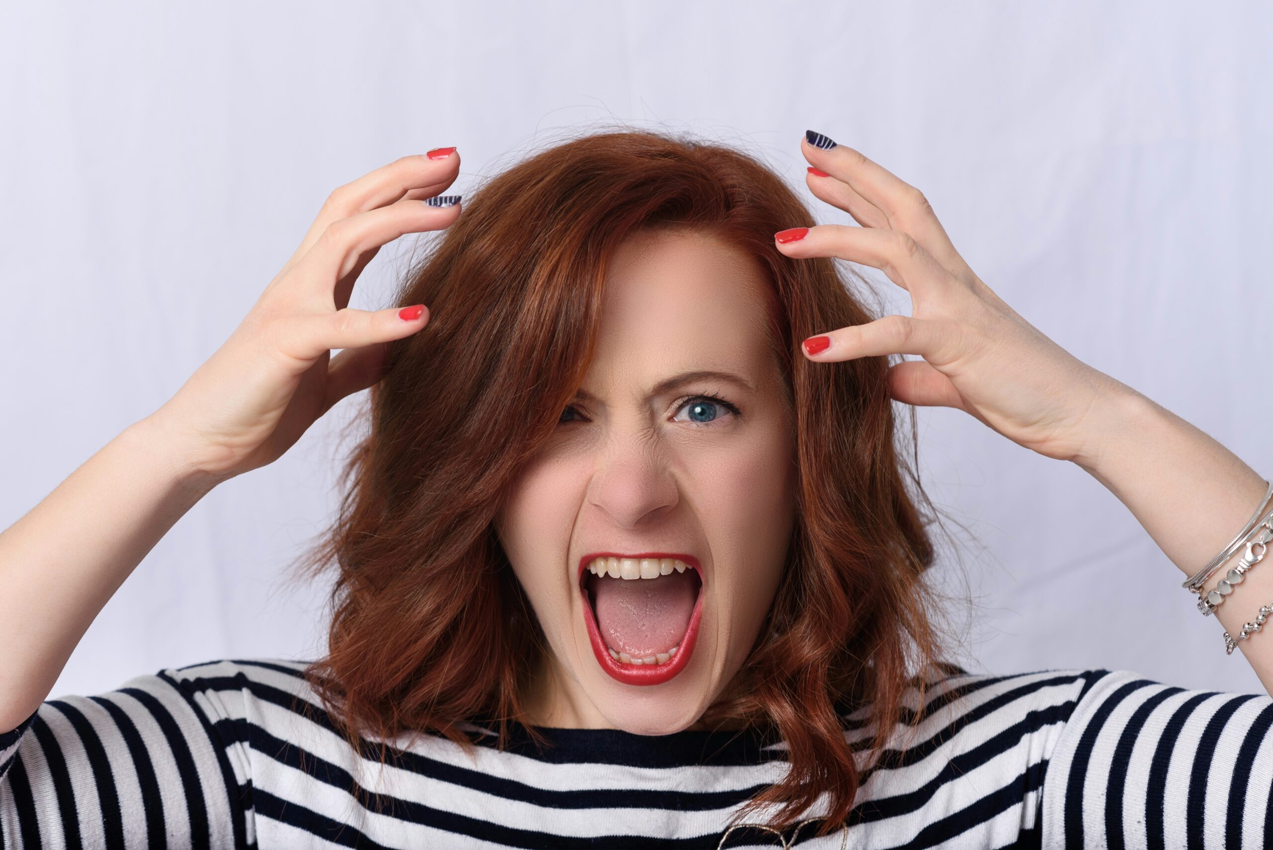 woman screaming at herself