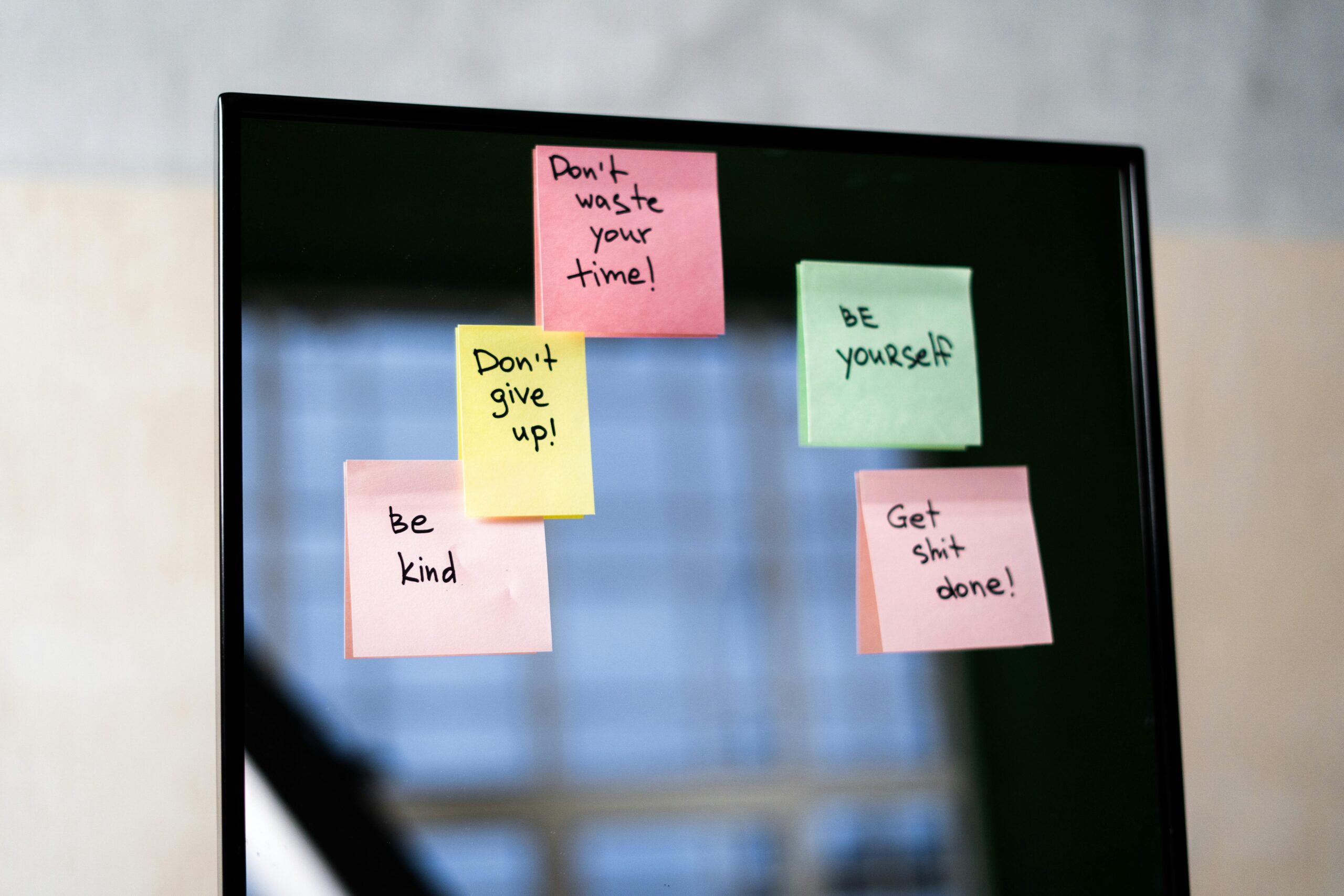 post its on a board with quotes