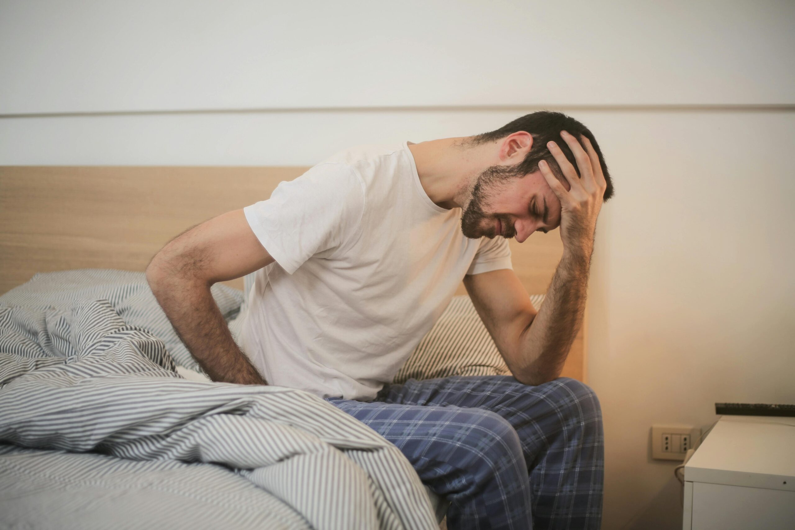 man hurting when getting out of bed