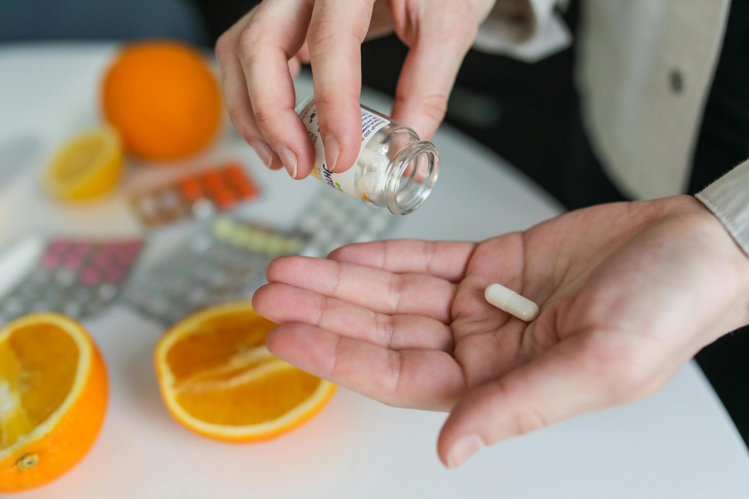 person taking a prescription medicine