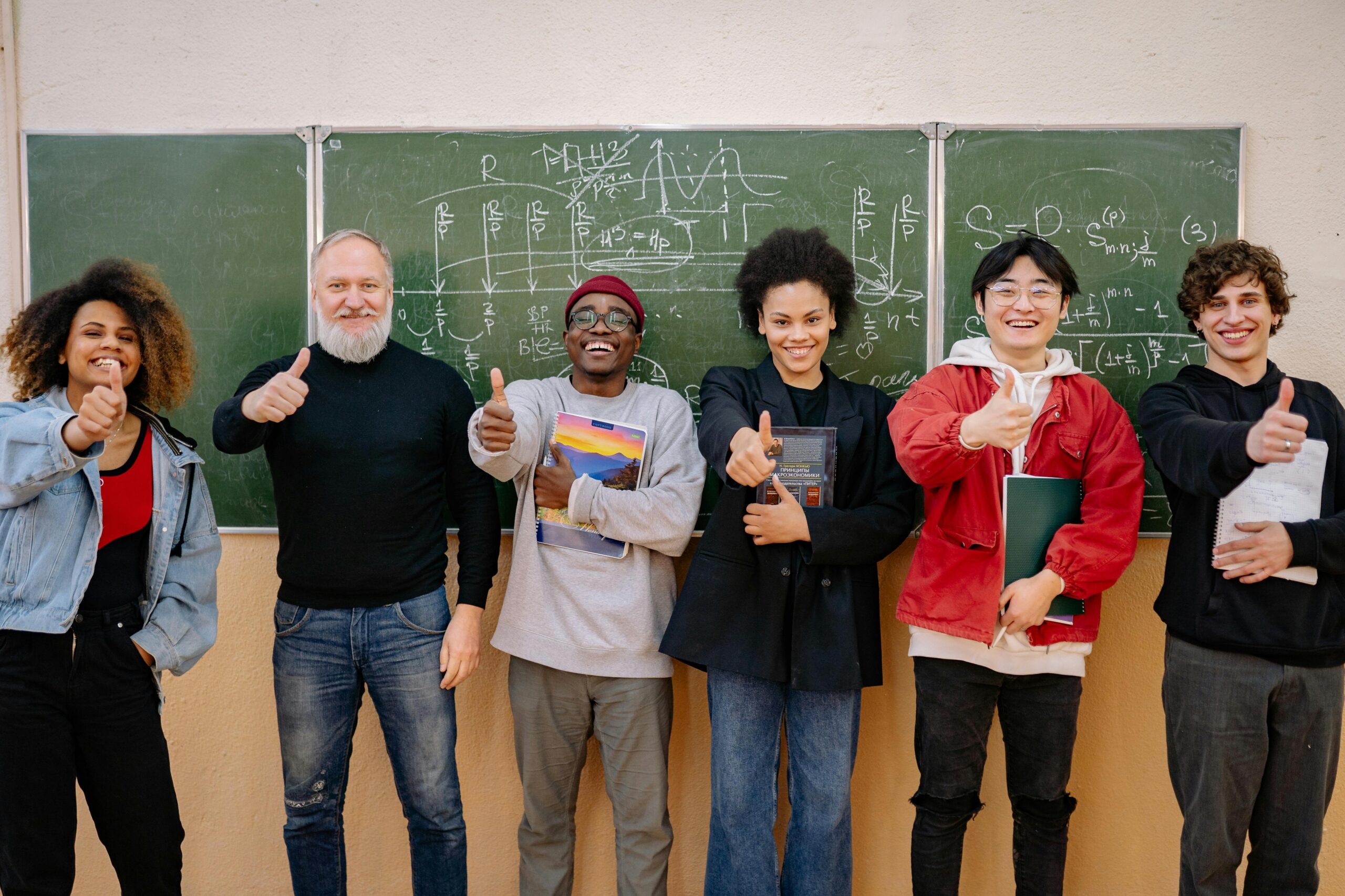 teenagers in a classroom with teachers