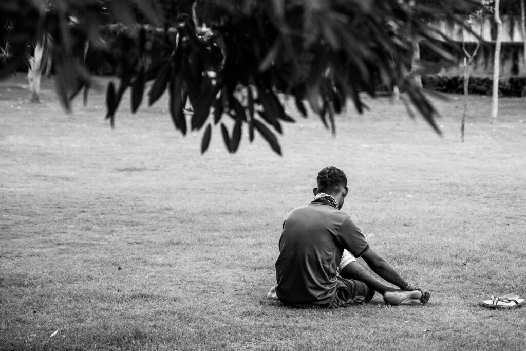man having a panic attack outside