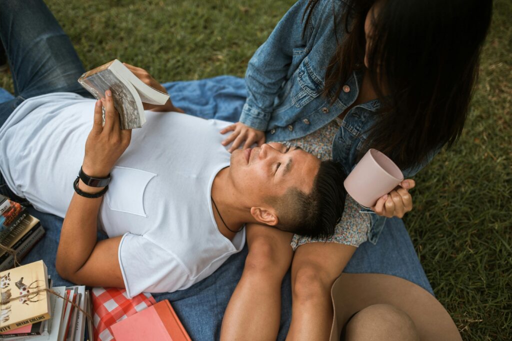 man laying head on lap