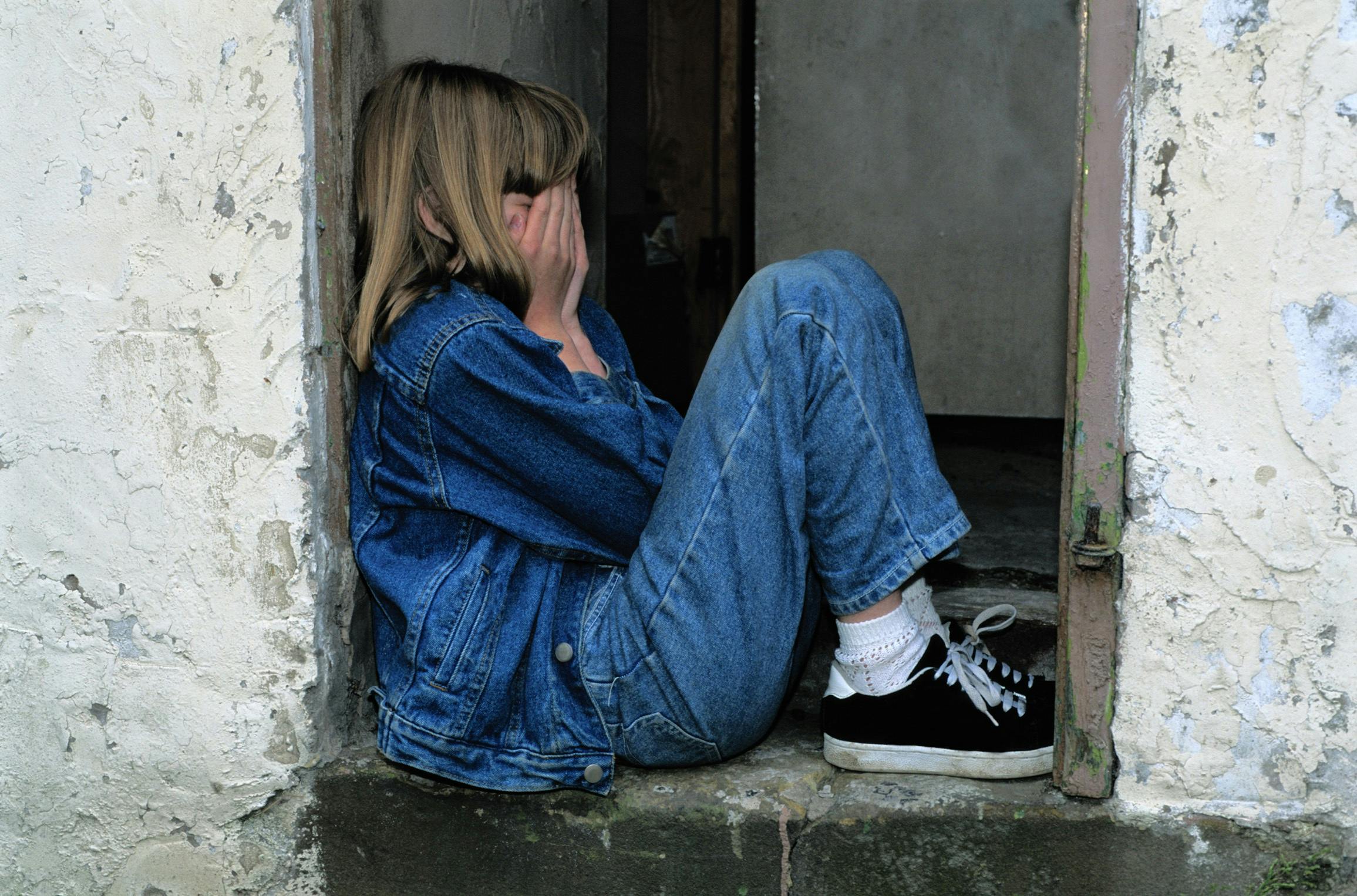 young teenage girl struggling with depression